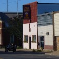 (North Bend, NE) Scooter’s 616th bar, first visited in 2009. The bartender’s side of the bar is a pit sunken down about 2 feet below floor level. The bar itself...