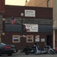 (Downtown, Emporia, KS) Formerly Lariat Lounge Scooter’s 1084th bar, first visited in 2015. Biker-friendly dive bar with a pool table in the front and a patio in the back. The...