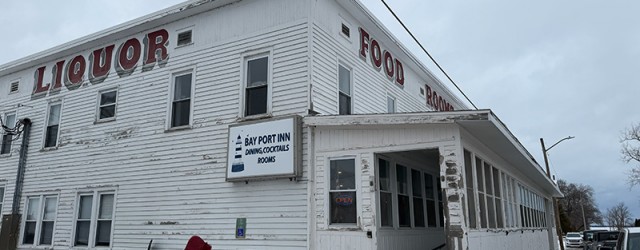 (Bay Port, MI) Scooter’s 1866th bar, first visited in 2026. This was our favorite bar that we found on this trip. Located in a building that used to be a...